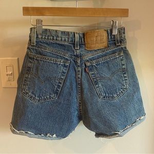 Vintage Levi’s High Waisted Denim Cutoff Shorts in a Medium Blue Wash